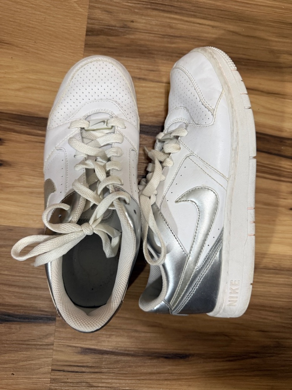 Nike Women’s White Sneakers with Silver Swoosh